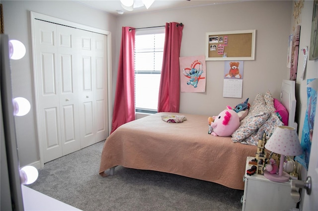 carpeted bedroom featuring a closet