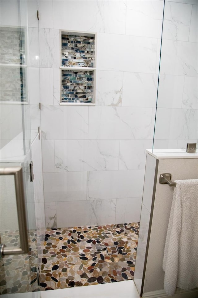 bathroom featuring walk in shower