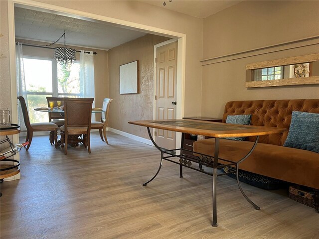 4100 Narvarez Way S, Saint Petersburg, FL 33712 - dining area featuring light wood-style flooring and baseboards