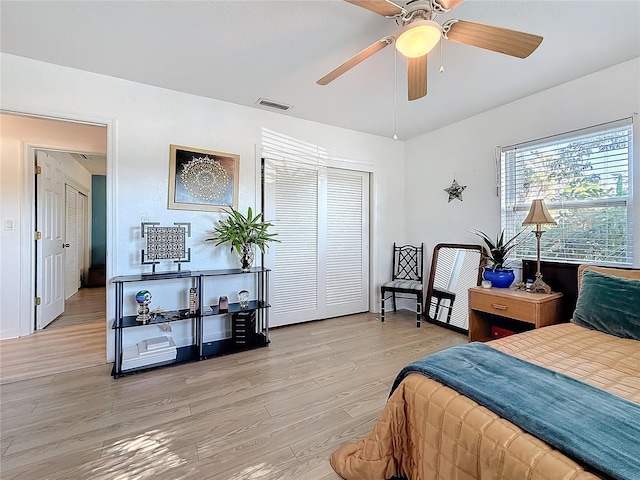 4100 Narvarez Way S, Saint Petersburg, FL 33712 - bedroom with light wood-style flooring, a closet, and a ceiling fan