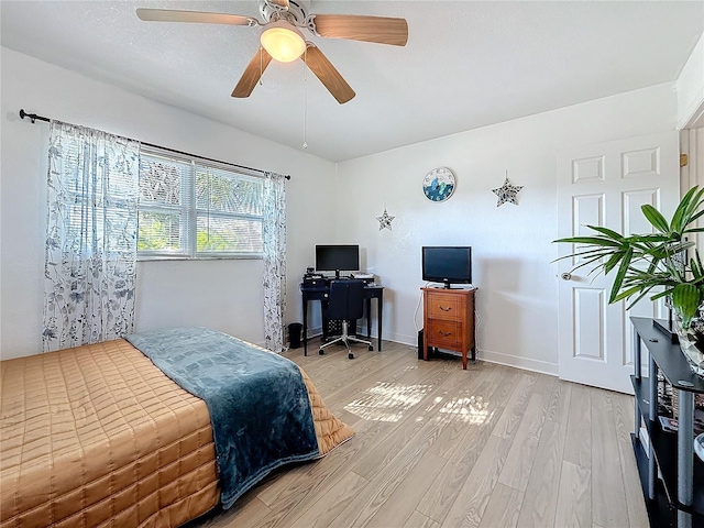 4100 Narvarez Way S, Saint Petersburg, FL 33712 - bedroom featuring light wood finished floors, ceiling fan, and an office area