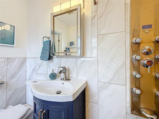 4100 Narvarez Way S, Saint Petersburg, FL 33712 - bathroom featuring tile walls, vanity, toilet, and a shower