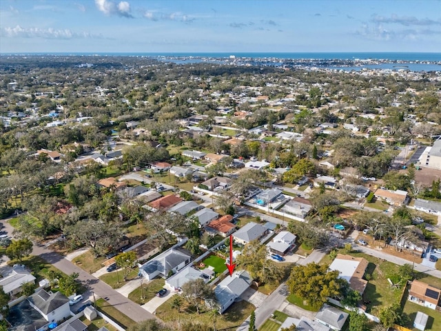 bird's eye view with a water view and a residential view