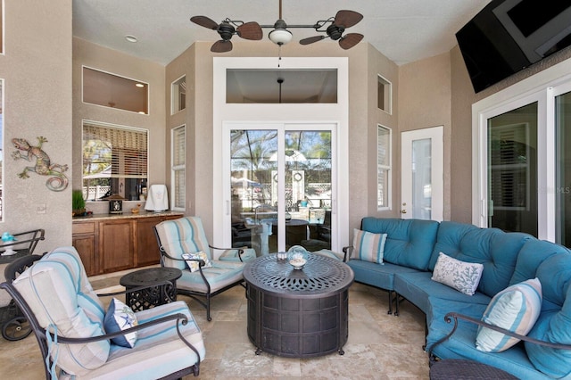 view of patio featuring outdoor lounge area and ceiling fan