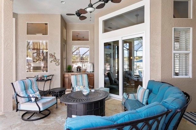 view of patio / terrace featuring ceiling fan and outdoor lounge area