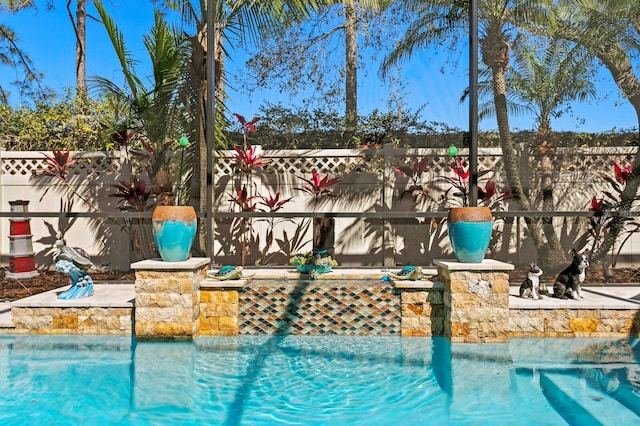 view of pool featuring a fenced backyard and a fenced in pool