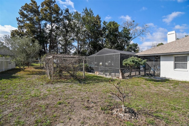 view of yard featuring fence