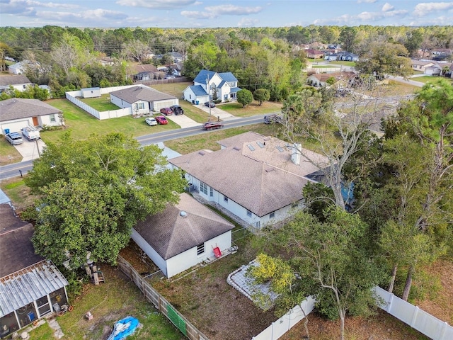 birds eye view of property with a residential view