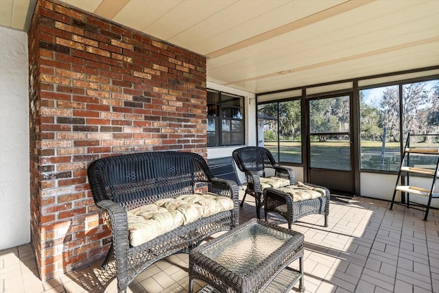 sunroom featuring wooden ceiling