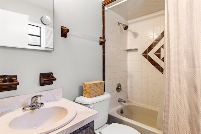 full bath featuring toilet, shower / bathtub combination with curtain, and a sink