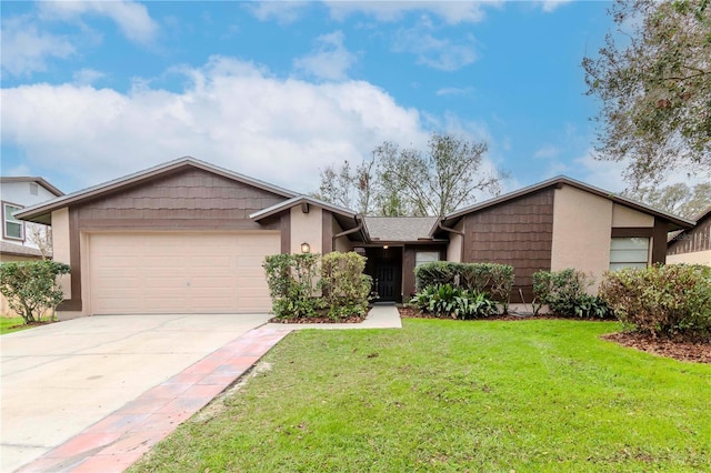 mid-century inspired home with a garage, driveway, a front lawn, and stucco siding