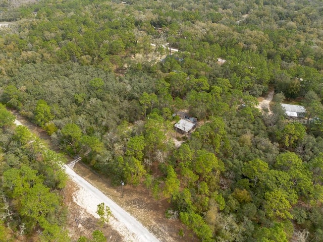 aerial view featuring a forest view