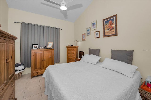 bedroom featuring light tile patterned floors and a ceiling fan