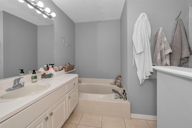 full bath featuring baseboards, vanity, a bath, and tile patterned floors