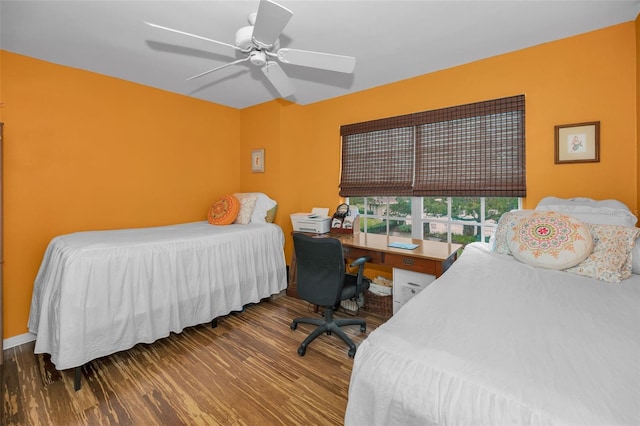 bedroom with ceiling fan and wood finished floors