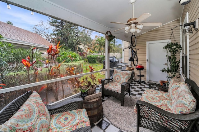 sunroom / solarium with ceiling fan