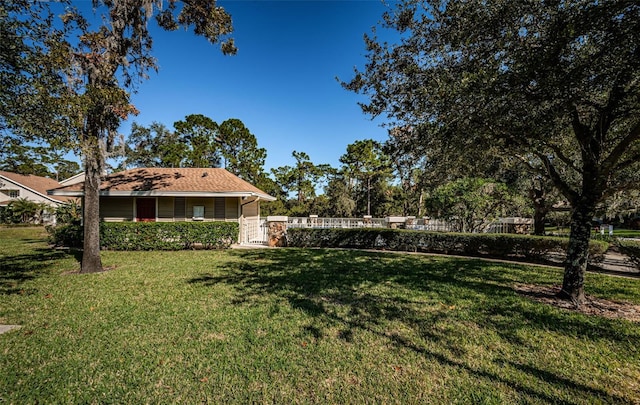 view of yard with fence