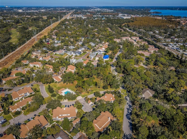 aerial view featuring a residential view and a water view