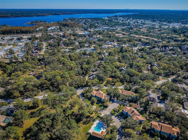 drone / aerial view featuring a water view and a residential view