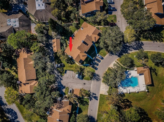 birds eye view of property with a residential view