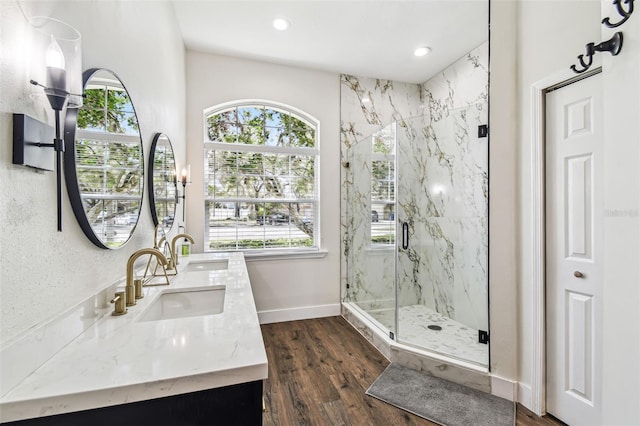 1301 Jen Ma Jo Ln, Lutz, FL 33549 - full bathroom with a marble finish shower, double vanity, recessed lighting, and wood finished floors