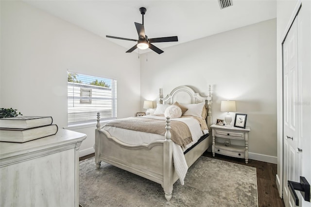 1301 Jen Ma Jo Ln, Lutz, FL 33549 - bedroom with a closet, wood finished floors, and a ceiling fan