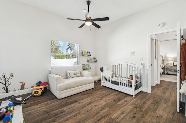 1301 Jen Ma Jo Ln, Lutz, FL 33549 - bedroom featuring wood finished floors, a crib, and a ceiling fan