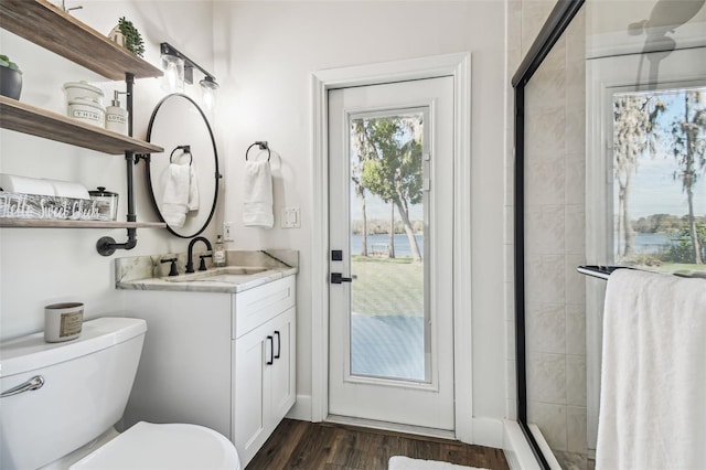1301 Jen Ma Jo Ln, Lutz, FL 33549 - full bath with vanity, a shower stall, wood finished floors, and a water view
