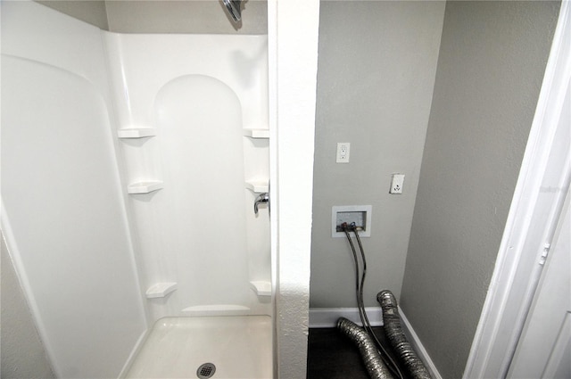 bathroom featuring a stall shower