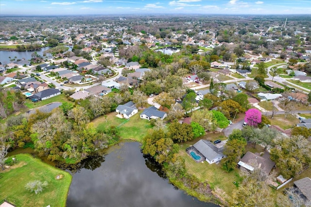 bird's eye view with a water view and a residential view