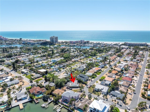 birds eye view of property featuring a residential view and a water view