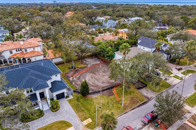 birds eye view of property with a residential view