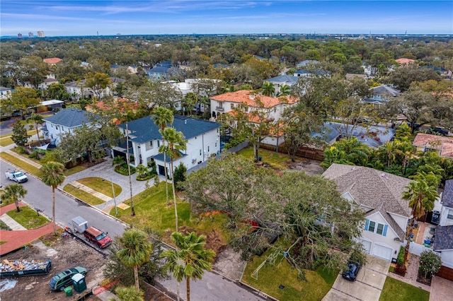 birds eye view of property with a residential view