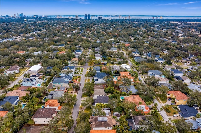 birds eye view of property with a residential view