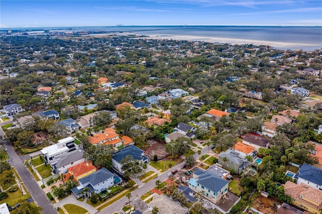 drone / aerial view with a residential view and a water view