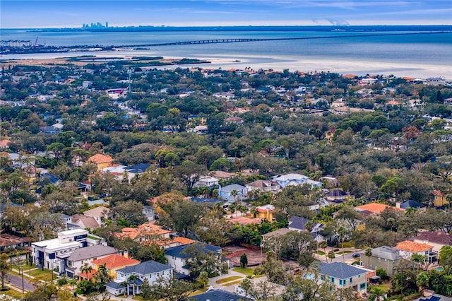 birds eye view of property featuring a residential view and a water view