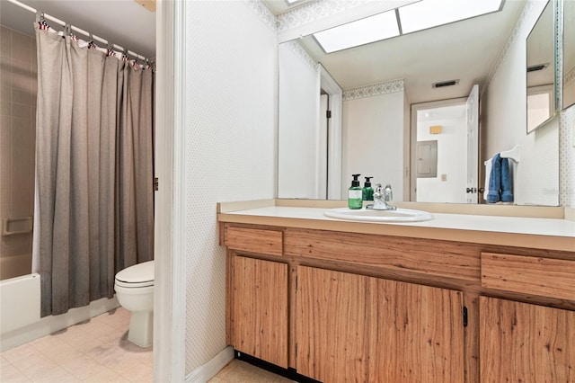 bathroom with a skylight, visible vents, toilet, shower / bath combo, and vanity