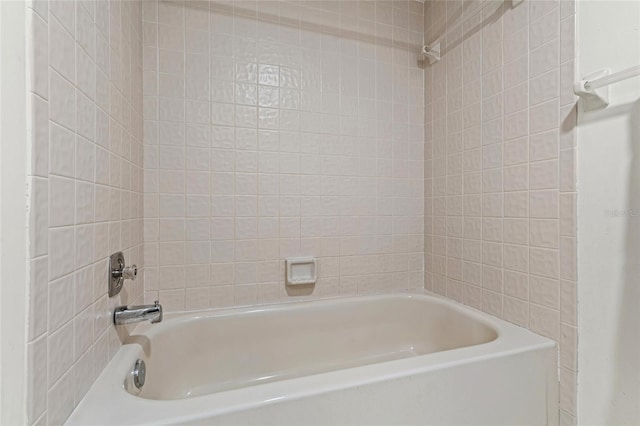 full bath featuring  shower combination