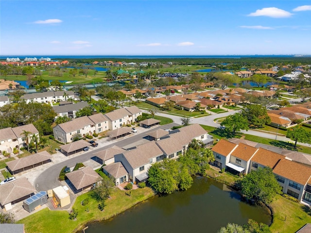 aerial view with a residential view and a water view