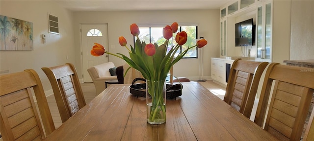 dining area featuring baseboards