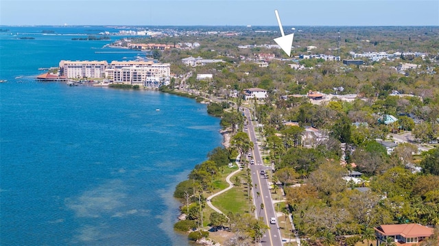 birds eye view of property featuring a water view