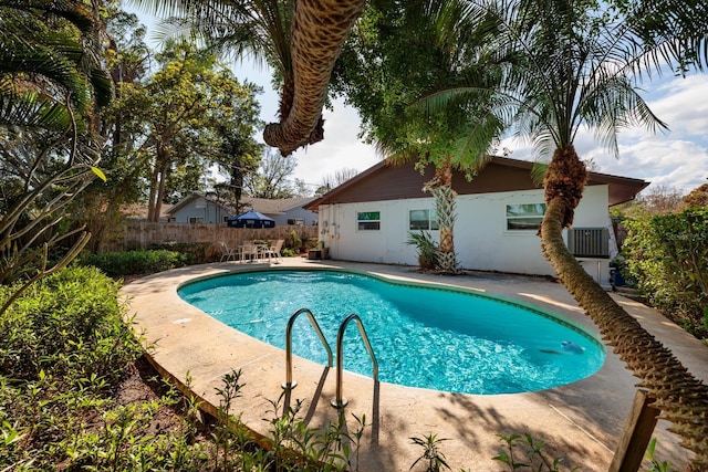 view of pool featuring a patio, fence, and a fenced in pool