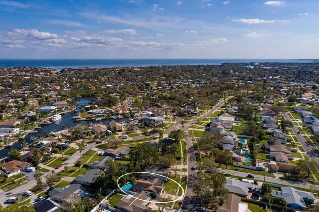 aerial view with a residential view and a water view