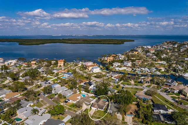 bird's eye view featuring a water view and a residential view