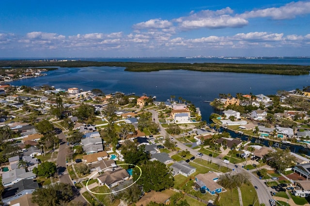 bird's eye view featuring a water view and a residential view