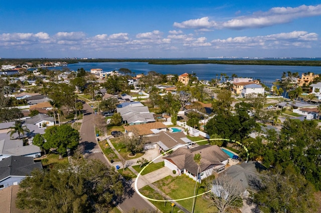 bird's eye view with a water view and a residential view