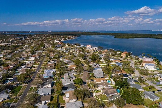 aerial view with a residential view and a water view