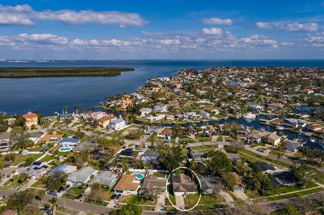 aerial view with a water view and a residential view