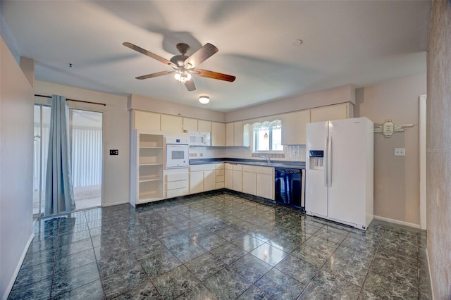 kitchen with white appliances, baseboards, white cabinets, and decorative backsplash