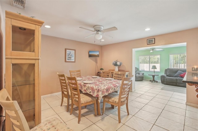 dining room featuring light tile patterned floors, baseboards, visible vents, a ceiling fan, and recessed lighting